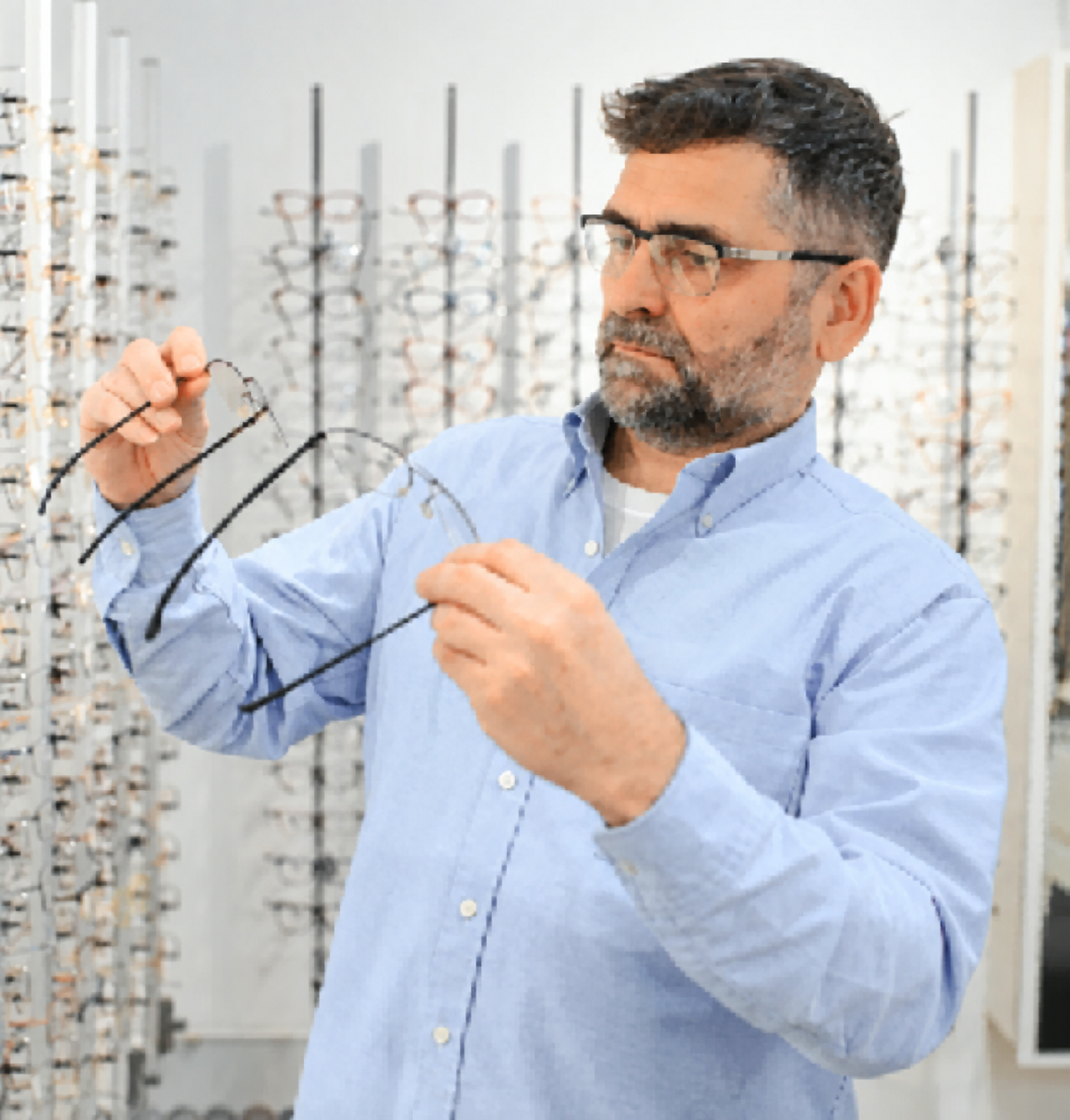 Man selecting eye glasses